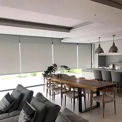 Roller blinds in an open-plan dining and living room, Custom Blinds South Africa