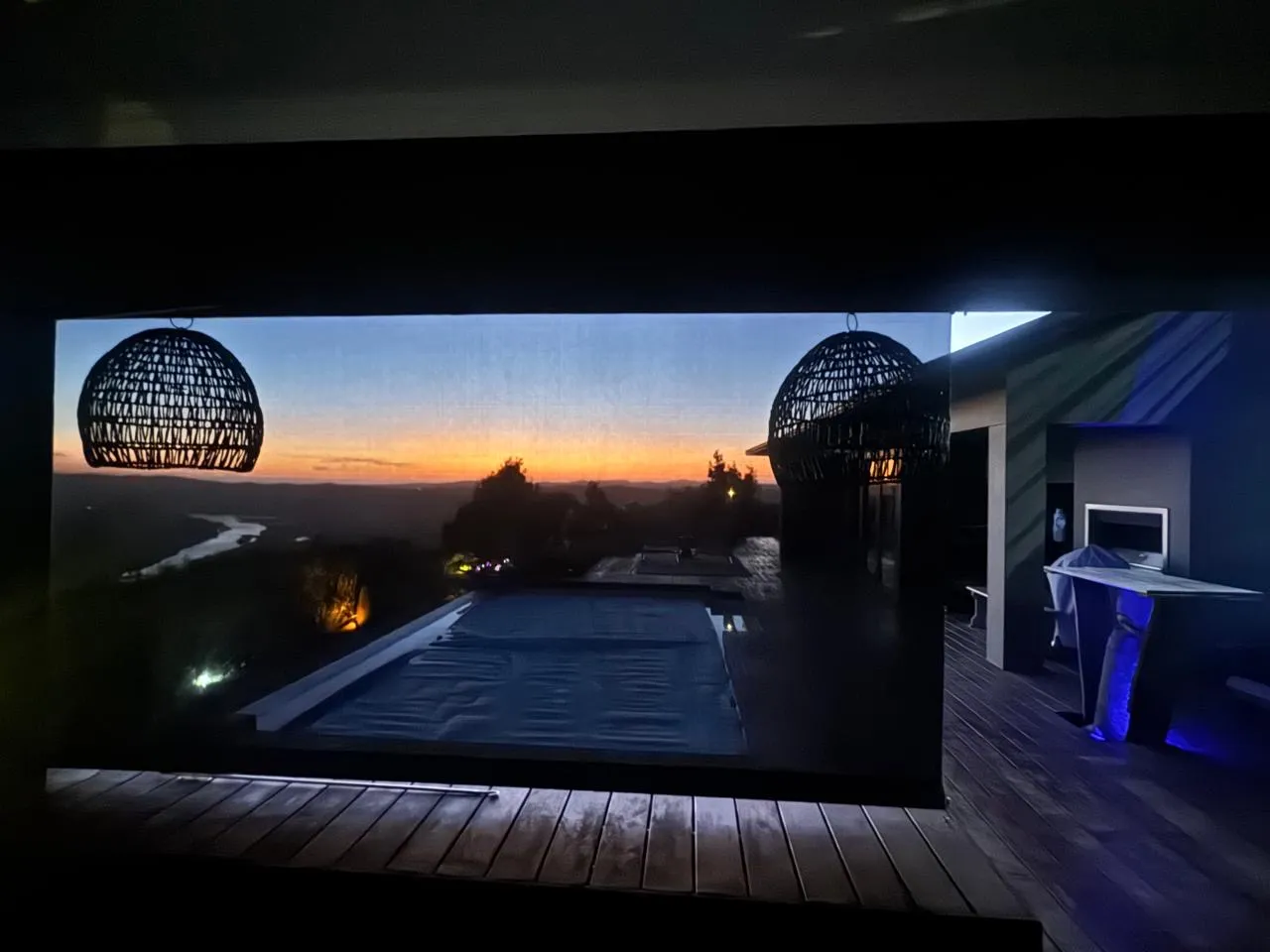Outdoor blinds on a deck with scenic sunset views — Custom Blinds Garden Route